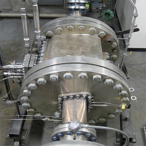 Picture of the LSU warm cascade. Pressure taps and thermocouples extensionsare extracted through sealing glands on the left. Combustor is upstream of the picture. Flow is from bottom to top