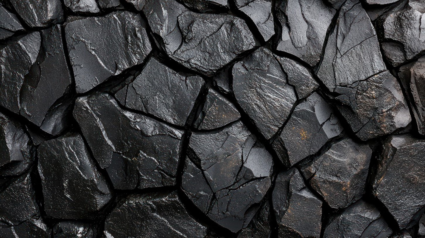 Close up photograph of a pile of coal.