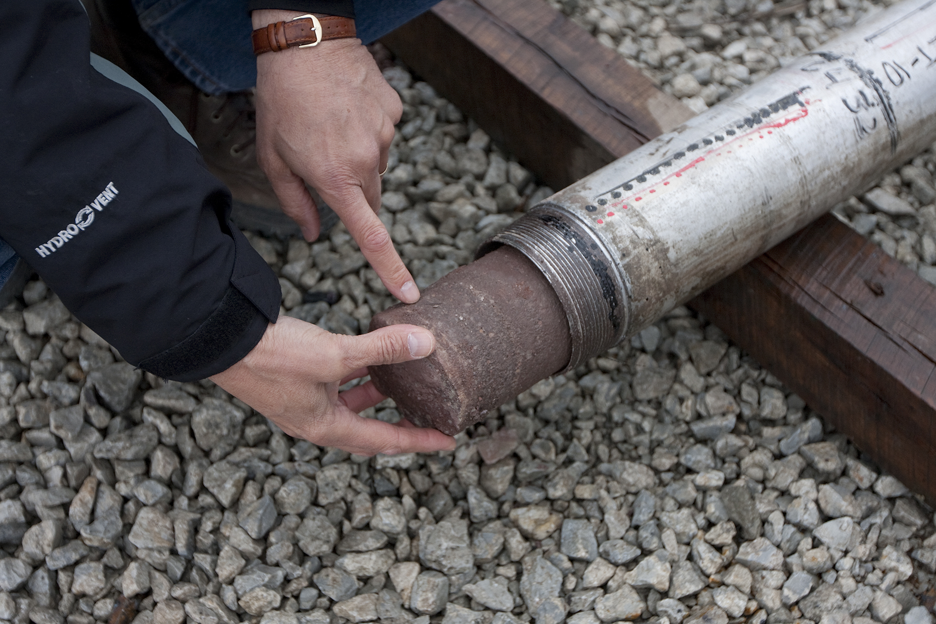 A piece of the Mt. Simon Sandstone core sticks out of the core barrel pulled from the injection well at IBDP.