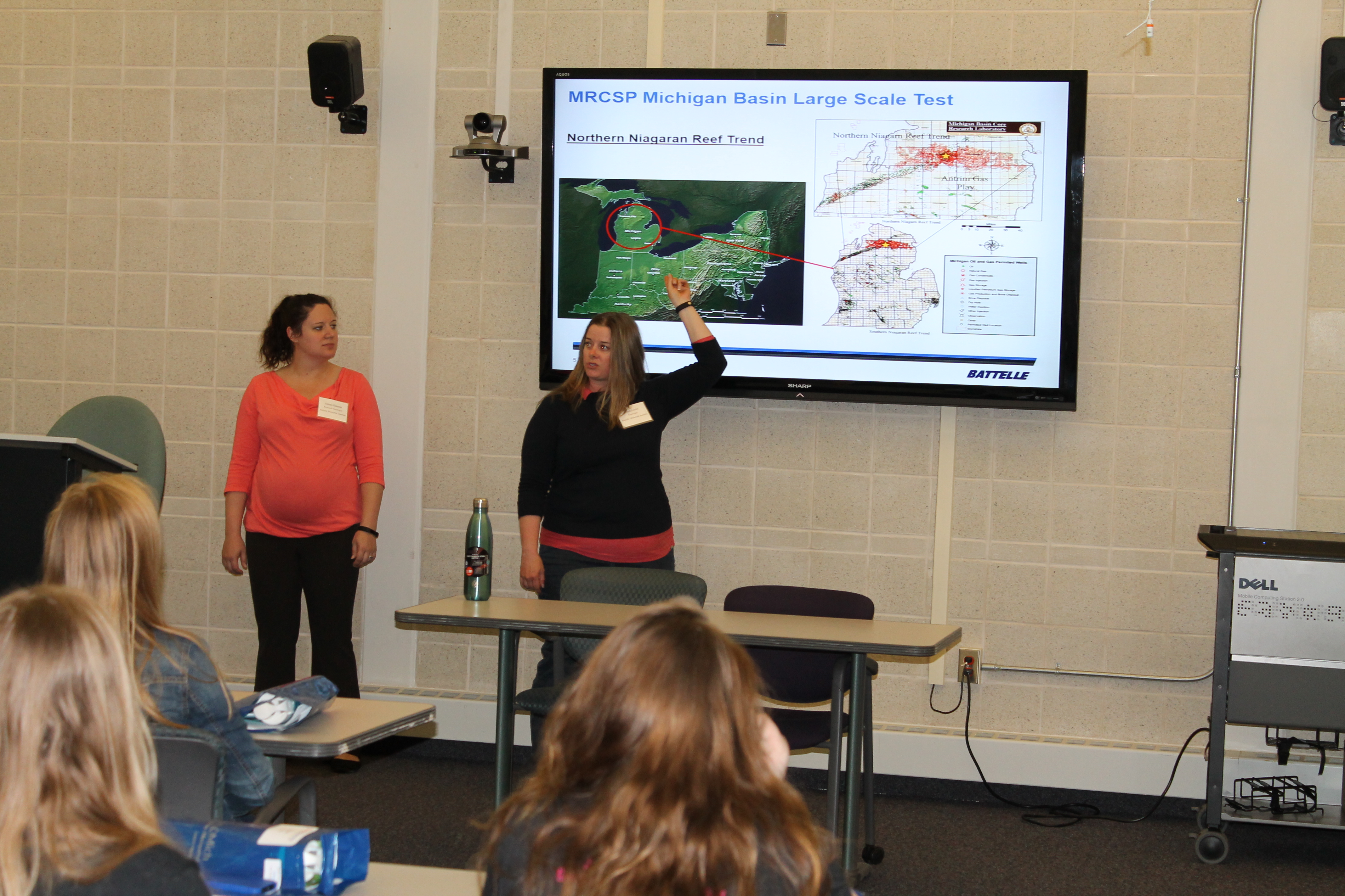 Photographs from a 2017 science, technology, engineering, and mathematics (STEM) outreach activity in Gaylord, Michigan, teaching middle school girls about Michigan geology and CCUS.
