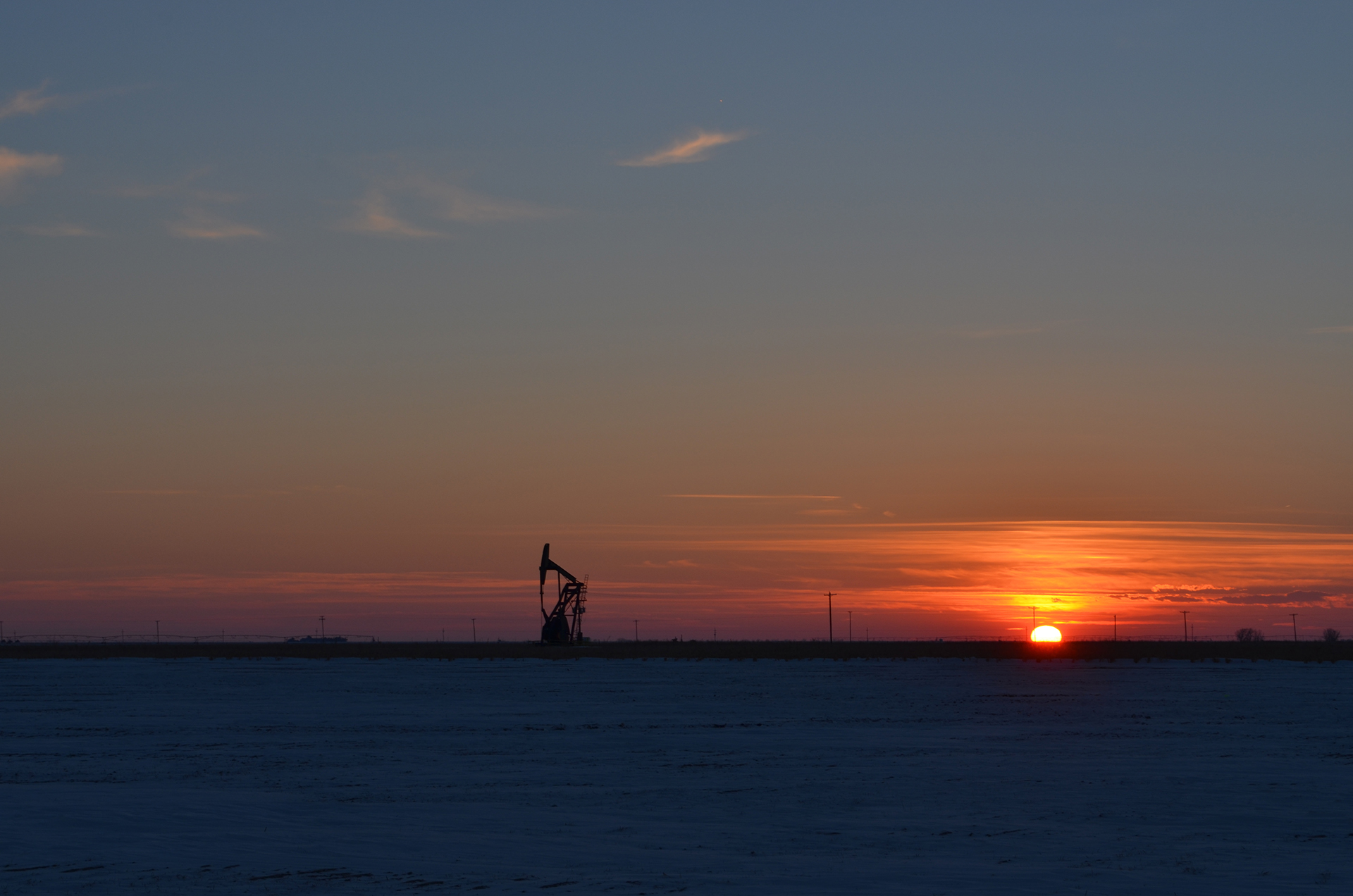 Pumpjack and sunset at the Farnsworth Unit.