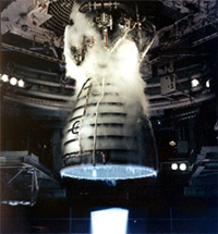 The combustion of hydrogen and oxygen produces a nearly invisible flame as seen in this photo of the Space Shuttle's main engine. The clean reaction generates only water and heat.  Photo courtesy of NASA.