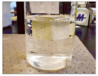 Ultra-lightweight hollow glass sphere slurries exhibit densities less than water