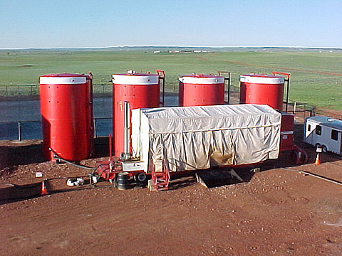 Three-phase decanter centrifuge treating tank bottoms sludge.