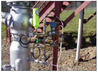 Portable Acoustic Monitoring Package (PAMP) installed at a pipeline surface connection