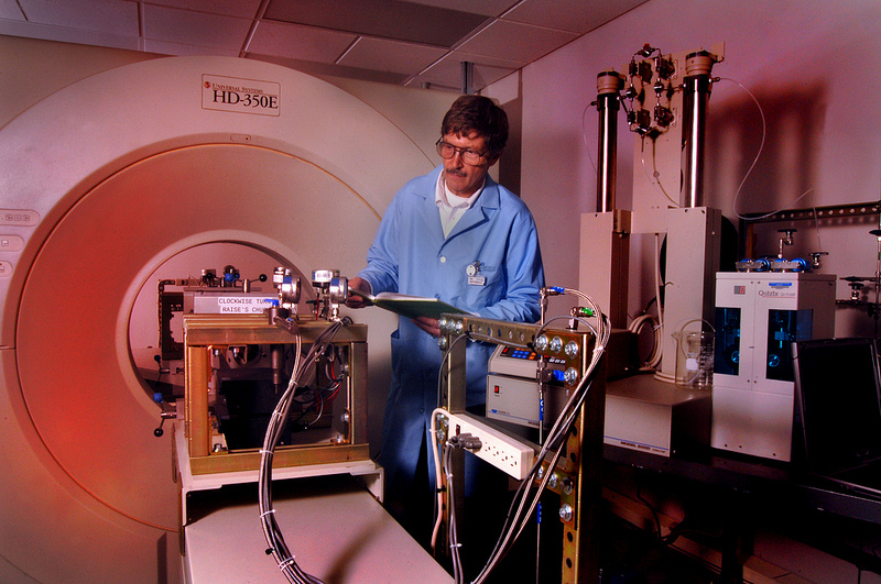 Researcher at NETL utilizes a CT scanner to measure in situ fluid displacement and sorption of fluids within mineral cores.