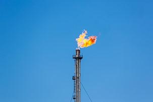 The process of flaring at a gas and oil production site.