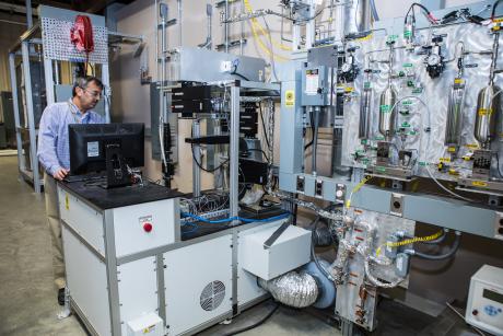 NETL’s Dushyant Shekhawat working in the Reaction Analysis and Chemical Transformation (ReACT) facility in Morgantown, WV.