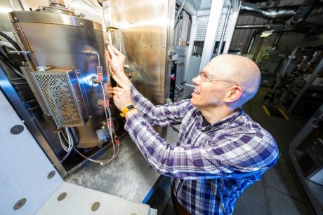 NETL researcher Eric Popczun, seen here in the lab, is the principal investigator of the OASIS project.