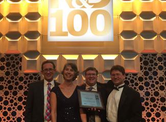Accepting a 2017 R&D 100 Award at festivities in Orlando, FL are team members, left to right, Bob Dilmore of NETL, Elizabeth Keating of Los Alamos National Laboratory (LANL), Grant Bromhal of NETL, and Phil Stauffer of LANL. The team’s product, the National Risk Assessment Partnership Toolset, was designated as one of the top 100 technologies of the year.